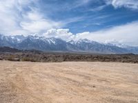 California's Mountainous Landscape: Dirt Roads and Clear Skies
