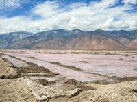 the landscape is muddy and colorful with mountains in the background to provide an artistic effect to the surroundings