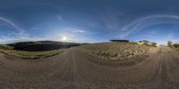 360 view camera image of the road leading to the house on top of a hill