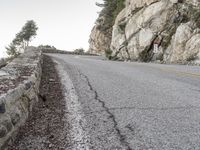 California Road: Asphalt Surrounded by Mountains and Nature