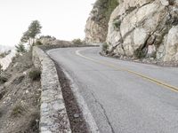 California Road: Asphalt Surrounded by Mountains and Nature