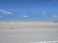 California Road Coastline Under Blue Skies