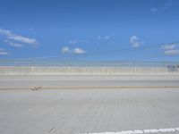 California Road Coastline Under Blue Skies