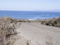 California Road With Low Headlands Over the Ocean