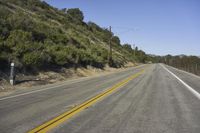 California Road with Yellow Tree and Clear Sky