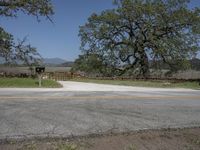 this is an image of the entrance to a ranch gate on the side of the road