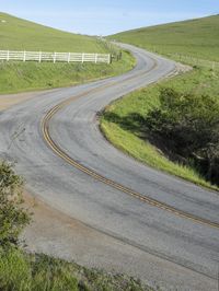 California Rural Road Through Green Fields