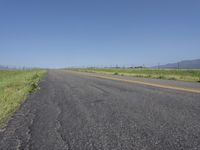 California Rural Road Through Lush Green Fields