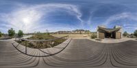 a fish eye view of a skateboard park with ramps and ramps in the foreground