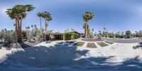 a panoramic view shows the outside of a building with a skateboard ramp