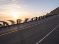 California Sunrise: A Coastal Highway Bathed in Sunlight