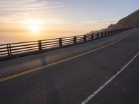 California Sunrise: A Coastal Highway Bathed in Sunlight