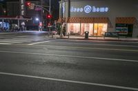 an empty street is shown at night in the city area of san francisco, california