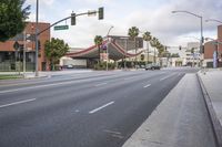 the city has several roads with traffic lights above them to highlight how they're located