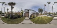 two spherical photos show a car and trees in the front and side of it and a house with a driveway