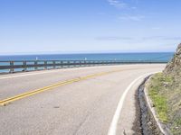 Coastal Road in California, USA: A Tranquil Ride Under a Clear Sky