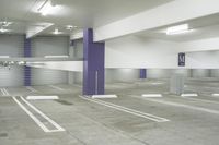 a parking garage with multiple floor and white walls and ceilings and purple beams and a painted ceiling