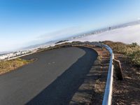 California, USA: A Road with Asphalt, Day and Clear Sky