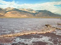 this is the top part of a salt panoramically with mountains in the background