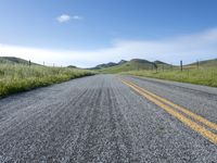 Straight Road Through Lush Green Fields in California, USA