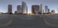 an upside down view of a street through a convex lens lens, with skyscrapers in the background