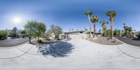 a skateboarder is riding down a ramp that runs around his yard in this 360 - view