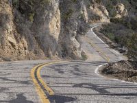 California's Winding Road: Through Low Mountains and Rugged Terrain