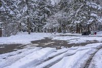 Canada Lake and Residential House on a Snow-Covered Road