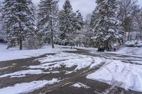 Canada Lake and Residential House on a Snow-Covered Road