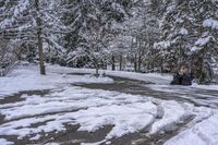 Canada Lake and Residential House on a Snow-Covered Road