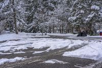 Canada Lake and Residential House on a Snow-Covered Road