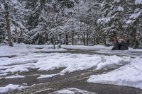 Canada Lake and Residential House on a Snow-Covered Road