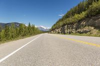 Canada Landscape Road Through Lowlands to Majestic Mountains