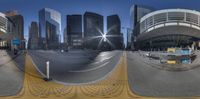 the view of a street in front of some buildings and an upside down mirror that says world trade center