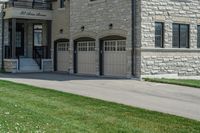 a big nice stone building with a fire hydrant in front of it and stairs