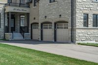 a big nice stone building with a fire hydrant in front of it and stairs