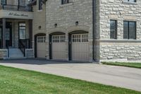 a big nice stone building with a fire hydrant in front of it and stairs