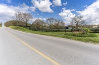 Canada Road through Farm Fields in Green Landscape