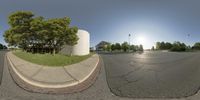 two fish eye lens images are in various positions on the same street corner and the opposite image shows two street corners with grass in both sides