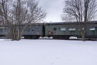 Canada's Winter Industrial Landscape: Snow-Covered Factories and Railroad Tracks