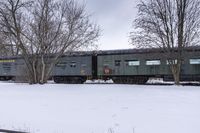 Canada's Winter Industrial Landscape: Snow-Covered Factories and Railroad Tracks