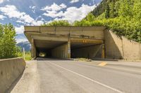 Canadian Architecture: Asphalt Road in a Low Landscape