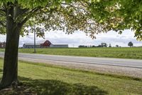 Rural landscape in Ontario, Canada with a road and architecture