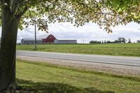 Rural landscape in Ontario, Canada with a road and architecture