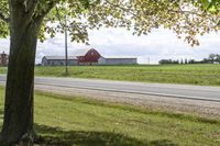 Rural landscape in Ontario, Canada with a road and architecture