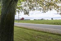 Rural landscape in Ontario, Canada with a road and architecture