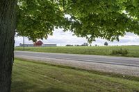 Rural landscape in Ontario, Canada with a road and architecture