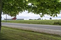 Rural landscape in Ontario, Canada with a road and architecture