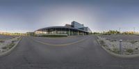 the empty parking lot of an airport and car park in a modern circular view with bright light shining down