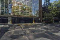 this is a parking garage with a fire hydrant in front of it in an intersection